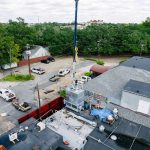 A Look at Our Crane Lift Installation at Boudreaux's